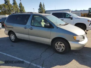 1999 Toyota Sienna LE with VIN 4T3ZF13C6XU162657, listed as a Copart auction lot 48332235 with 280,159 mi miles and Clean Title. Bid and sale history available at carsss.com. Image 4.