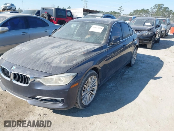 2014 BMW 3 Series 335i with VIN WBA3A9C54EF477943, listed as a IAAI auction lot 41632554 with 102,273 mi miles. Bid and sale history available at carsss.com. Image 17.