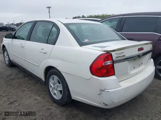 2005 Chevrolet Malibu LS with VIN 1G1ZT52875F296680, listed as a IAAI auction lot 41876757 with 303,880 mi miles. Bid and sale history available at carsss.com. Image 3.