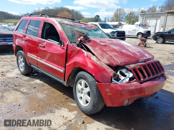 2010 Jeep Grand Cherokee Laredo with VIN 1J4PR4GK9AC143199, listed as a IAAI auction lot 41972153 with 81,896 mi miles. Bid and sale history available at carsss.com. Image 1.