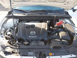 2014 Mazda 3 i Grand Touring with VIN JM1BM1M7XE1102093, listed as a IAAI auction lot 41344433 with 148,395 mi miles and . Bid and sale history available at DreamBid. Image 10.