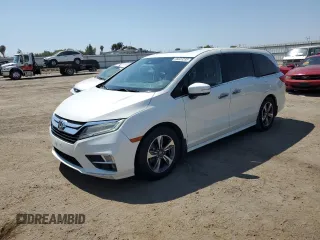 2018 Honda Odyssey Touring with VIN 5FNRL6H83JB062670, listed as a Copart auction lot 65623235 with 180,037 mi miles and Clean title. Bid and sale history available at DreamBid. Image 1.