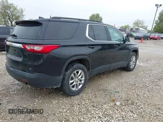 2021 Chevrolet Traverse LT with VIN 1GNERHKW0MJ218426, listed as a IAAI auction lot 42178273 with 76,545 mi miles and . Bid and sale history available at DreamBid. Image 4.