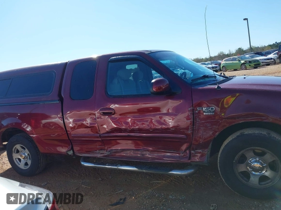 2003 Ford F-150 XL with VIN 1FTRX17W43NA07186, listed as a IAAI auction lot 41864354 with 123,565 mi miles. Bid and sale history available at carsss.com. Image 13.