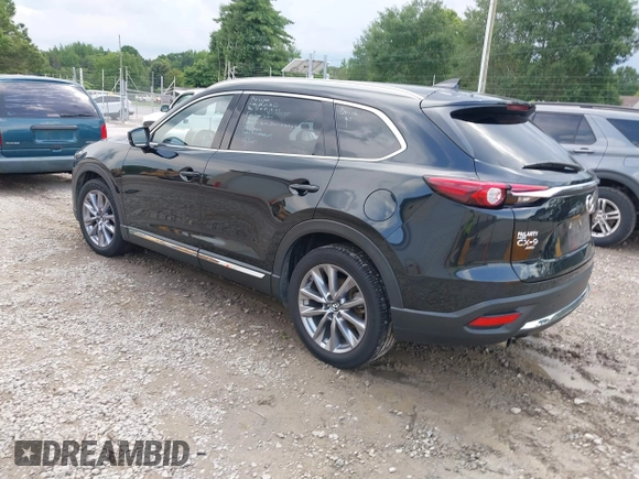 2022 Mazda CX-9 Grand Touring with VIN JM3TCBDYXN0627657, listed as a IAAI auction lot 42498856 with 61,044 mi miles and . Bid and sale history available at DreamBid. Image 3.