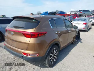 2017 Kia Sportage EX with VIN KNDPN3AC6H7109141, listed as a IAAI auction lot 41848646 with 123,211 mi miles. Bid and sale history available at carsss.com. Image 4.