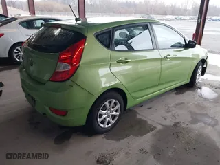 2014 Hyundai Accent GS with VIN KMHCT5AE6EU168619, listed as a IAAI auction lot 41856429 with 227,552 mi miles. Bid and sale history available at carsss.com. Image 4.