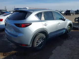 2020 Mazda CX-5 Touring with VIN JM3KFACM1L0789394, listed as a IAAI auction lot 41565887 with 73,730 mi miles. Bid and sale history available at carsss.com. Image 4.