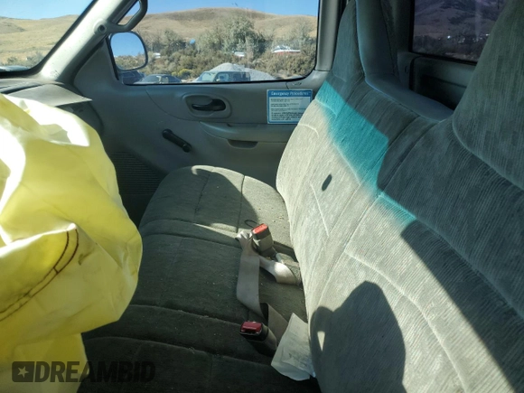 2000 Ford F-150 XL with VIN 2FTPF17Z5YCA99717, listed as a Copart auction lot 70658194 with Not provided miles and Salvage title. Bid and sale history available at DreamBid. Image 7.