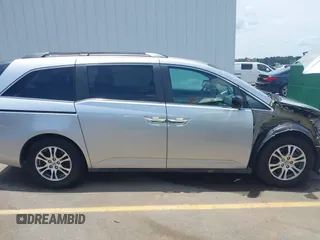 2012 Honda Odyssey EX-L with VIN 5FNRL5H65CB076534, listed as a IAAI auction lot 42440258 with 150,866 mi miles and . Bid and sale history available at DreamBid. Image 14.