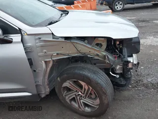 2022 Hyundai Santa Fe SEL z VIN 5NMS34AJ2NH476238, wystawiony jako IAAI lot #42119497 z przebiegiem 23 883 mil mil oraz . Historia ofert i sprzedaży dostępna na DreamBid. Obrazek 18.