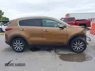 2017 Kia Sportage EX z VIN KNDPN3AC2H7053067, wystawiony jako IAAI lot #42660750 z przebiegiem Nie podano mil oraz . Historia ofert i sprzedaży dostępna na DreamBid. Obrazek 14.