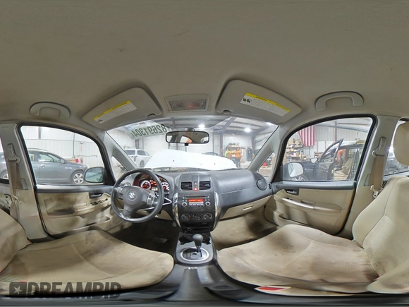 2011 Suzuki SX4 LE z VIN JS2YC5A29B6302397, wystawiony jako Copart lot #82691304 z przebiegiem 251 382 mil mil oraz Szkoda całkowita • Salvage title. Historia ofert i sprzedaży dostępna na DreamBid. Obrazek 13.