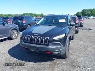 2016 Jeep Cherokee Trailhawk z VIN 1C4PJMBS6GW162742, wystawiony jako IAAI lot #42383200 z przebiegiem 124 791 mil mil oraz . Historia ofert i sprzedaży dostępna na DreamBid. Obrazek 12.