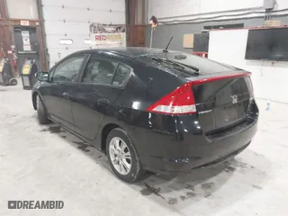 2010 Honda Insight EX with VIN JHMZE2H79AS022637, listed as a IAAI auction lot 41974256 with 102,782 mi miles. Bid and sale history available at carsss.com. Image 3.