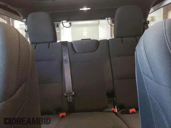 2023 Jeep Wrangler Sport Altitude with VIN 1C4HJXDG0PW679789, listed as a Copart auction lot 65991094 with 13,503 mi miles and Salvage Title. Bid and sale history available at DreamBid. Image 10.