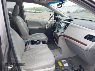2014 Toyota Sienna XLE with VIN 5TDYK3DC0ES436502, listed as a IAAI auction lot 42180990 with 154,839 mi miles and . Bid and sale history available at DreamBid. Image 5.