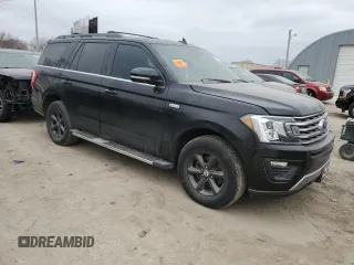 2018 Ford Expedition XLT with VIN 1FMJU1JT3JEA71037, listed as a Copart auction lot 47416415 with 106,487 mi miles and Salvage title. Bid and sale history available at DreamBid. Image 4.