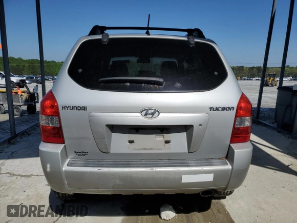 2006 Hyundai Tucson GL with VIN KM8JM12B46U461583, listed as a Copart auction lot 51854405 with 146,951 mi miles and Salvage Title. Bid and sale history available at carsss.com. Image 6.