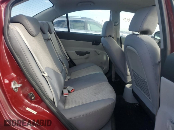 2011 Hyundai Accent GLS z VIN KMHCN4AC8BU534935, wystawiony jako Copart lot #44384775 z przebiegiem 137 328 mil mil oraz Szkoda całkowita • Salvage title. Historia ofert i sprzedaży dostępna na DreamBid. Obrazek 10.
