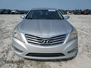 2013 Hyundai Azera z VIN KMHFG4JG9DA252768, wystawiony jako Copart lot #59143035 z przebiegiem 118 260 mil mil oraz Czysty tytuł • Clean title. Historia ofert i sprzedaży dostępna na DreamBid. Obrazek 5.