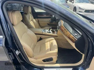 2015 BMW 7 Series 750i xDrive with VIN WBAYB6C5XFD965910, listed as a Copart auction lot 55407895 with 173,486 mi miles and Salvage Title. Bid and sale history available at carsss.com. Image 7.