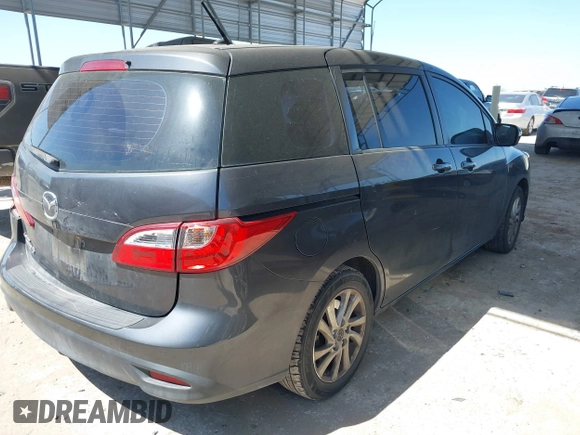 2015 Mazda Mazda5 Sport with VIN JM1CW2BL6F0190989, listed as a IAAI auction lot 41783326 with 90,505 mi miles. Bid and sale history available at carsss.com. Image 4.