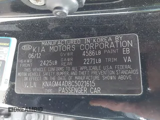 2012 Kia Optima Hybrid with VIN KNAGM4AD8C5021615, listed as a IAAI auction lot 41216697 with 119,153 mi miles. Bid and sale history available at carsss.com. Image 9.