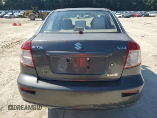 2011 Suzuki SX4 LE with VIN JS2YC5A27B6304410, listed as a Copart auction lot 72119824 with 118,357 mi miles and Salvage Title. Bid and sale history available at carsss.com. Image 6.