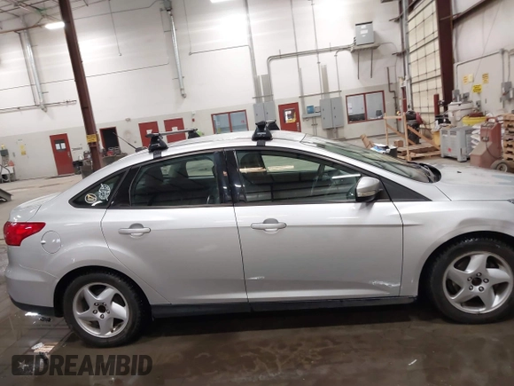 2015 Ford Focus SE with VIN 1FADP3F28FL231684, listed as a IAAI auction lot 41914284 with 100,195 mi miles. Bid and sale history available at carsss.com. Image 13.