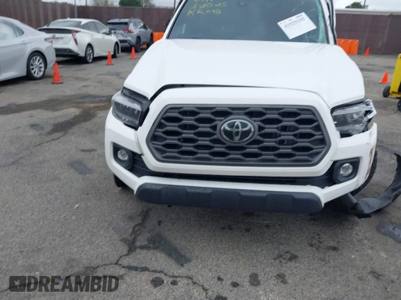 2023 Toyota Tacoma 4WD SR with VIN 3TMCZ5AN0PM550641, listed as a IAAI auction lot 41929355 with 18,917 mi miles. Bid and sale history available at carsss.com. Image 12.