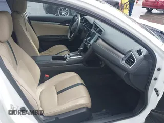 2017 Honda Civic EX-L z VIN 2HGFC1F79HH635156, wystawiony jako IAAI lot #41922115 z przebiegiem 142 565 mil mil oraz . Historia ofert i sprzedaży dostępna na DreamBid. Obrazek 5.