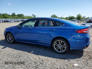 2017 Ford Fusion SE z VIN 3FA6P0T9XHR303675, wystawiony jako Copart lot #57134985 z przebiegiem 130 964 mil mil oraz Tytuł czysty. Historia ofert i sprzedaży dostępna na DreamBid. Obrazek 2.