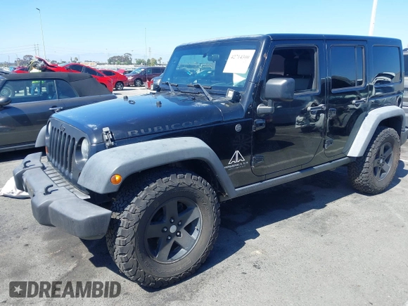2008 Jeep Wrangler Unlimited Rubicon with VIN 1J8GA69108L574773, listed as a IAAI auction lot 42714300 with 106,974 mi miles and . Bid and sale history available at DreamBid. Image 2.