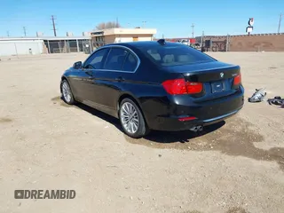 2012 BMW 3 Series 328i with VIN WBA3A5C58CF256254, listed as a IAAI auction lot 41676209 with 68,893 mi miles. Bid and sale history available at carsss.com. Image 3.