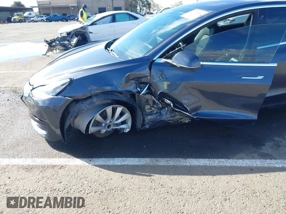 2018 Tesla Model 3 Long Range Battery with VIN 5YJ3E1EA4JF006036, listed as a IAAI auction lot 41934680 with 115,649 mi miles and . Bid and sale history available at DreamBid. Image 6.