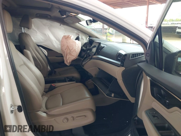 2021 Honda Odyssey Touring z VIN 5FNRL6H85MB034888, wystawiony jako IAAI lot #42386984 z przebiegiem 40 514 mil mil oraz . Historia ofert i sprzedaży dostępna na DreamBid. Obrazek 5.