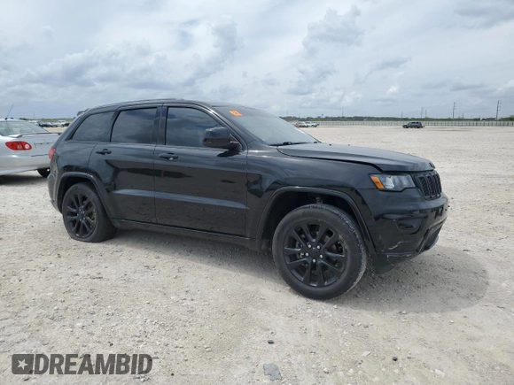 2018 Jeep Grand Cherokee Laredo E with VIN 1C4RJEAG4JC182430, listed as a Copart auction lot 50740255 with 117,944 mi miles and Salvage title. Bid and sale history available at DreamBid. Image 4.