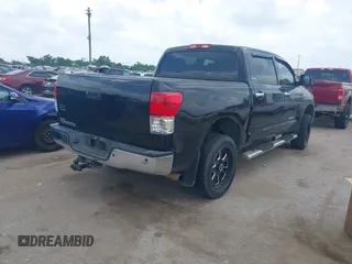 2013 Toyota Tundra Limited with VIN 5TFFY5F19DX142652, listed as a IAAI auction lot 42165369 with 152,286 mi miles and . Bid and sale history available at DreamBid. Image 4.