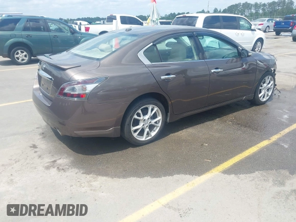 2014 Nissan Maxima S with VIN 1N4AA5AP9EC430843, listed as a IAAI auction lot 42104446 with 159,256 mi miles and . Bid and sale history available at DreamBid. Image 4.