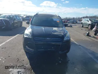 2015 Ford Escape Titanium with VIN 1FMCU0JX8FUC34459, listed as a IAAI auction lot 41394012 with 154,077 mi miles. Bid and sale history available at carsss.com. Image 12.