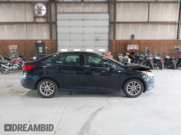 2018 Ford Focus SE with VIN 1FADP3FE8JL209560, listed as a IAAI auction lot 42707236 with 166,017 mi miles and . Bid and sale history available at DreamBid. Image 13.