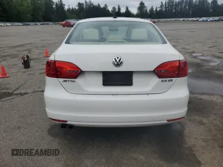 2012 Volkswagen Jetta SE with VIN 3VWDP7AJ5CM301293, listed as a Copart auction lot 57131005 with 93,898 mi miles and Salvage title. Bid and sale history available at DreamBid. Image 6.