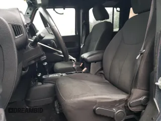 2016 Jeep Wrangler Unlimited Sport with VIN 1C4BJWDG2GL305086, listed as a Copart auction lot 48212105 with 113,001 mi miles and Salvage Title. Bid and sale history available at DreamBid. Image 7.