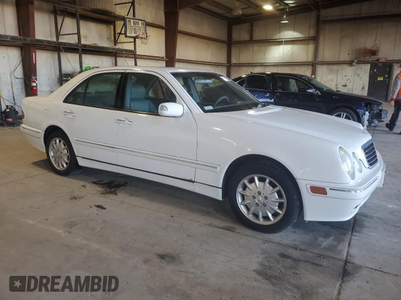 2000 Mercedes-Benz E-Class AWD with VIN WDBJF82J1YX029676, listed as a Copart auction lot 79412174 with 96,324 mi miles and Clean Title. Bid and sale history available at carsss.com. Image 4.