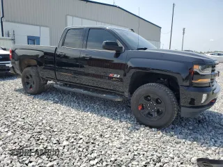 2018 Chevrolet Silverado 1500 LT with VIN 2GCVKRECXJ1107425, listed as a Copart auction lot 56134595 with 108,849 mi miles and Salvage Title. Bid and sale history available at DreamBid. Image 4.