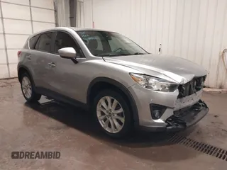2013 Mazda CX-5 Grand Touring with VIN JM3KE4DE8D0106118, listed as a IAAI auction lot 41395950 with 204,832 mi miles. Bid and sale history available at carsss.com. Image 1.