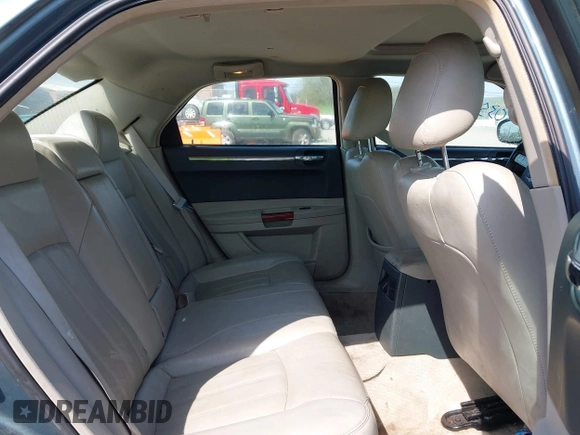 2006 Chrysler 300 C with VIN 2C3KA63H76H141246, listed as a IAAI auction lot 42035339 with 208,798 mi miles. Bid and sale history available at carsss.com. Image 8.