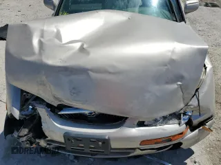2000 Mazda Millenia with VIN JM1TA2210Y1614967, listed as a Copart auction lot 53606185 with 120,288 mi miles and Salvage Title. Bid and sale history available at DreamBid. Image 11.