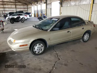 2002 Saturn SL z VIN 1G8ZH52842Z165459, wystawiony jako Copart lot #57273035 z przebiegiem 84 482 mil mil oraz Szkoda całkowita • Salvage title. Historia ofert i sprzedaży dostępna na DreamBid. Obrazek 1.